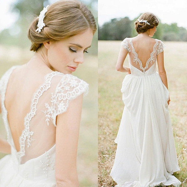 Соблазнительное свадебное платье с открытой спиной. Фото 1