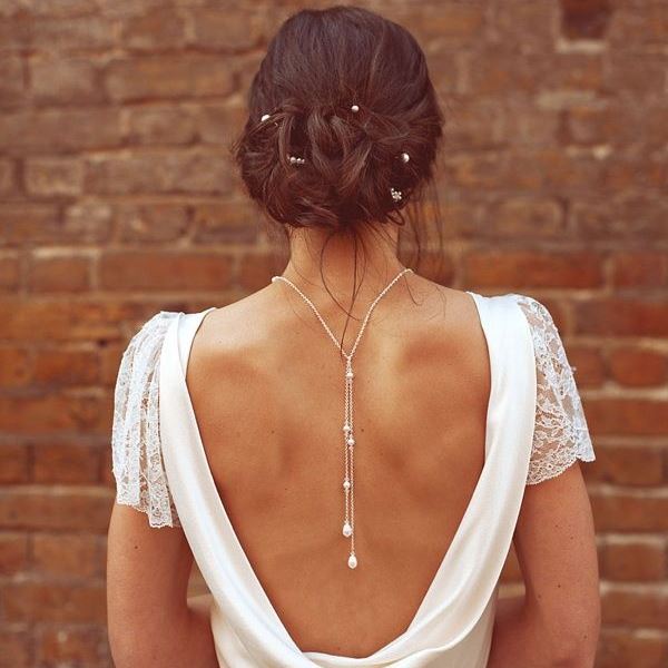Соблазнительное свадебное платье с открытой спиной. Фото 5