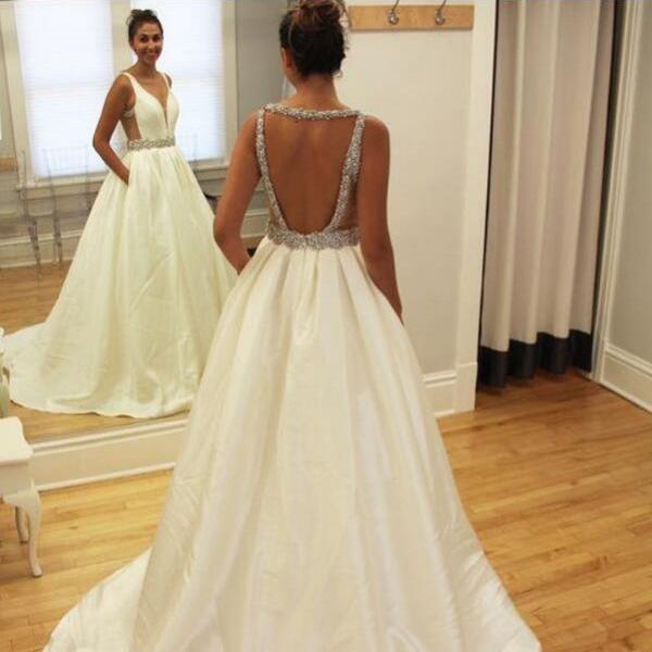 Соблазнительное свадебное платье с открытой спиной. Фото 12