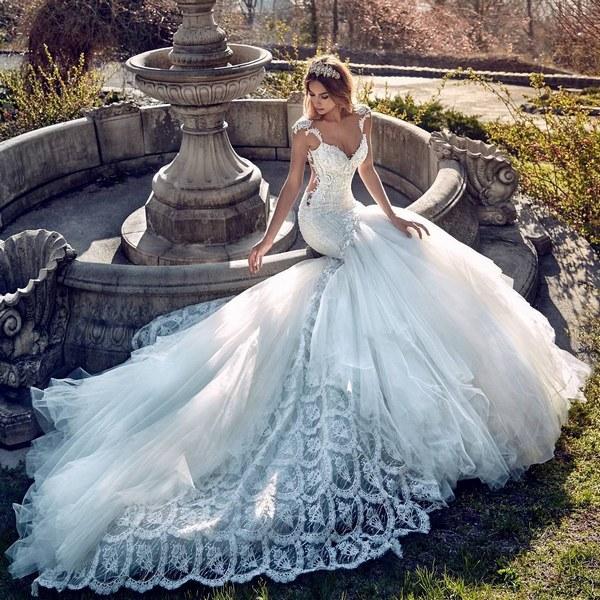 Платье невесты со шлейфом – изумительный наряд для настоящей королевы. Фото 24